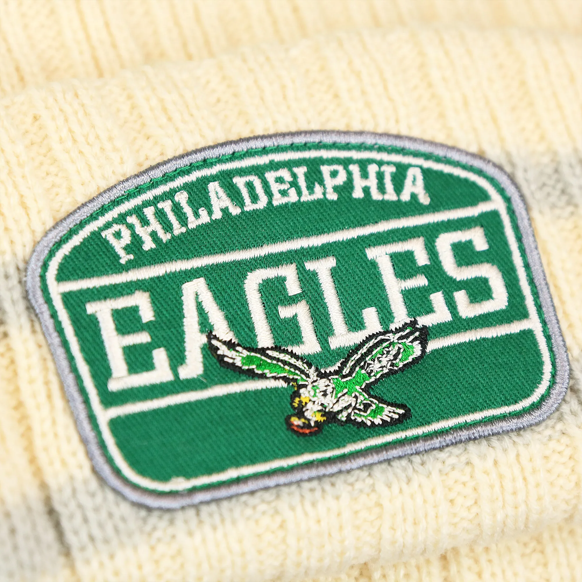 1987 Philadelphia Eagles Legacy Patch Pom Pom Beanie | Natural Beanie