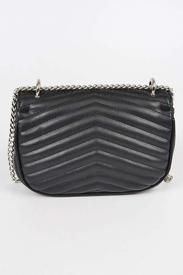 Black quilted clutch