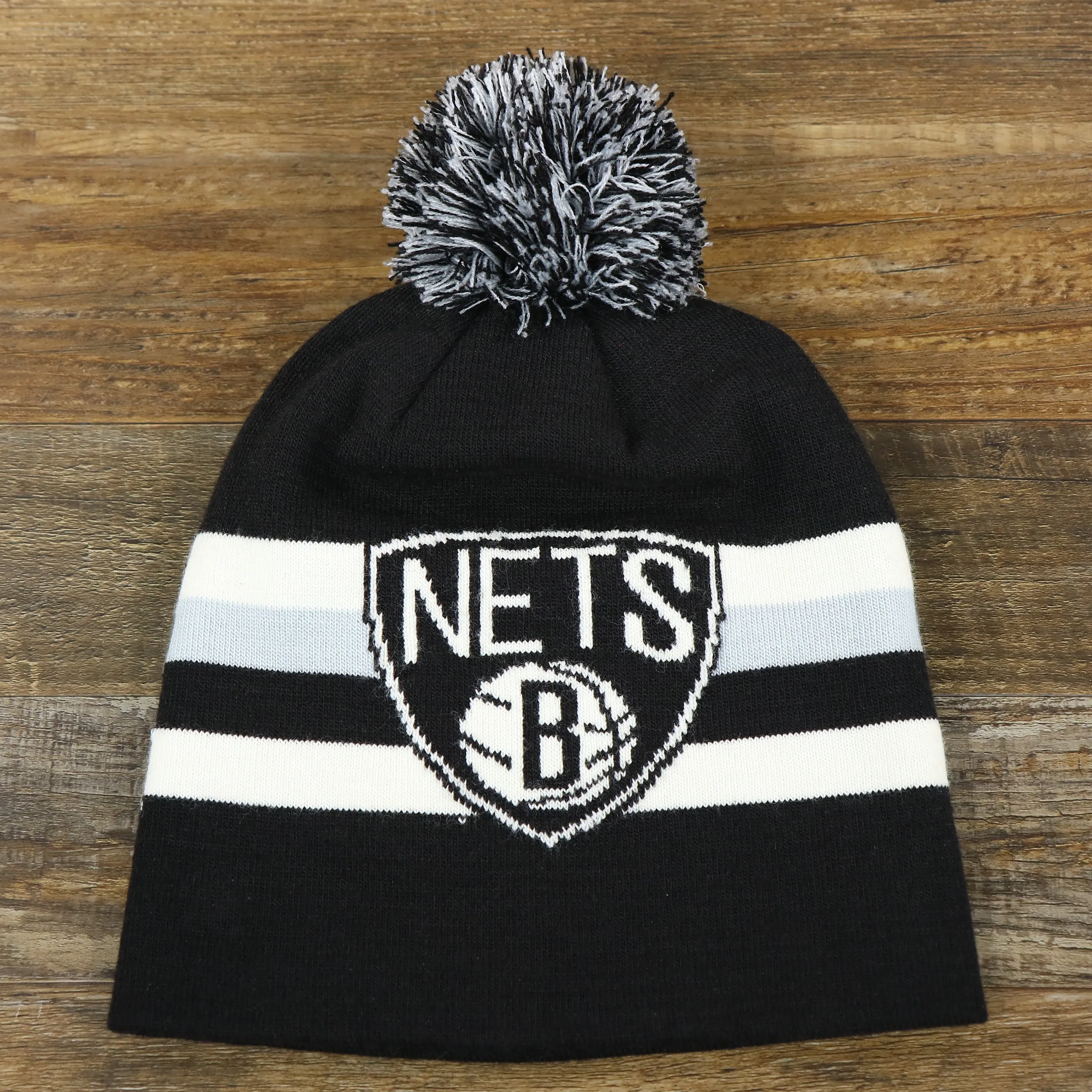 Black, White, and Gray Striped Winter Beanie with Pom Pom - Brooklyn Nets Collection