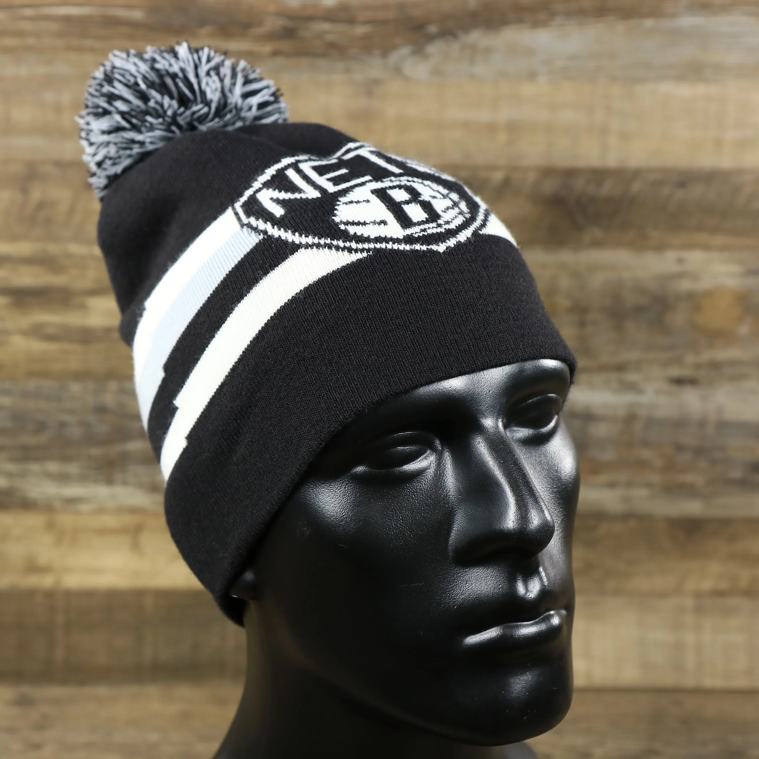 Black, White, and Gray Striped Winter Beanie with Pom Pom - Brooklyn Nets Collection