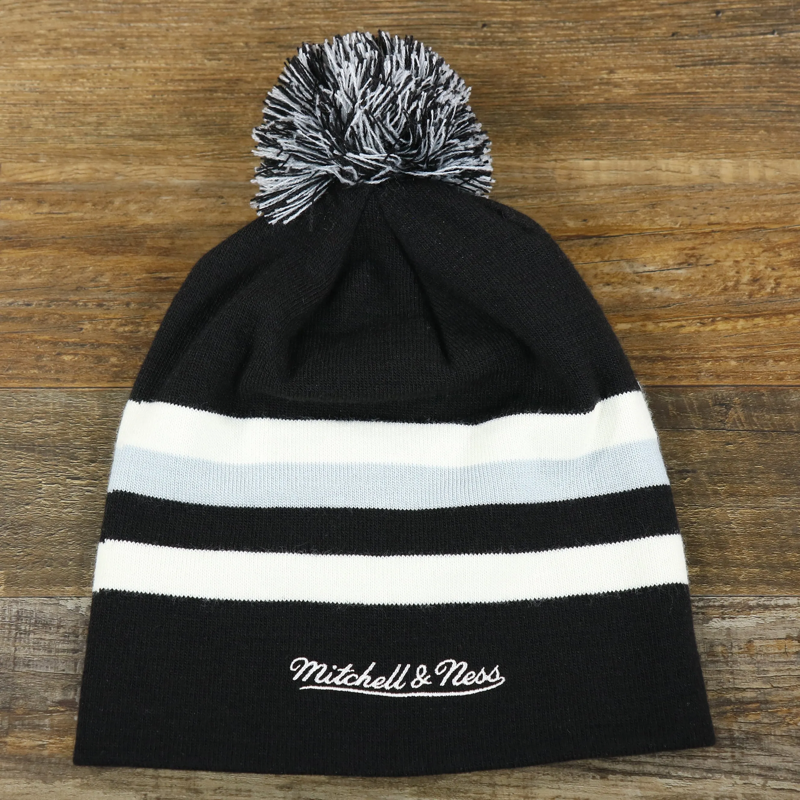 Black, White, and Gray Striped Winter Beanie with Pom Pom - Brooklyn Nets Collection