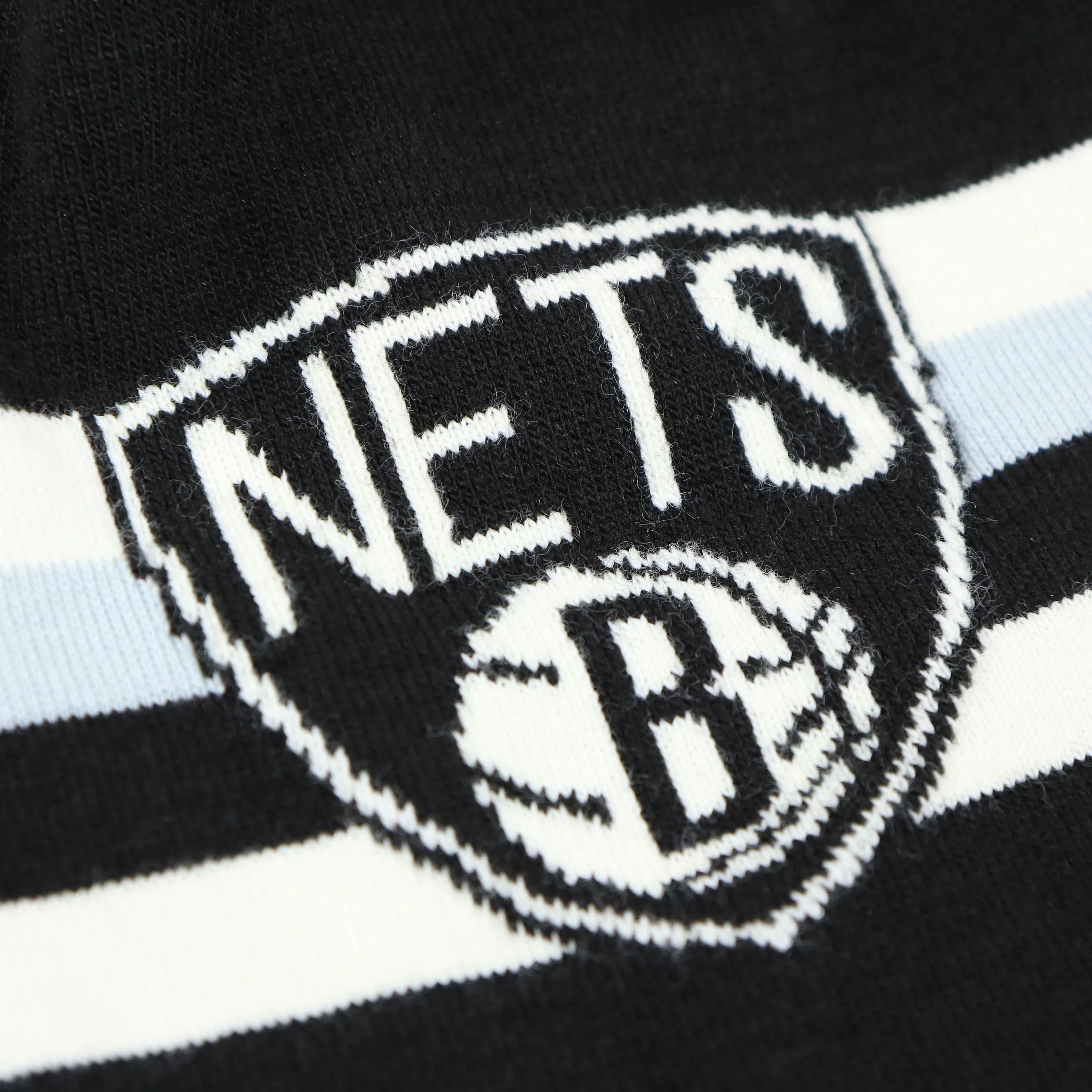 Black, White, and Gray Striped Winter Beanie with Pom Pom - Brooklyn Nets Collection