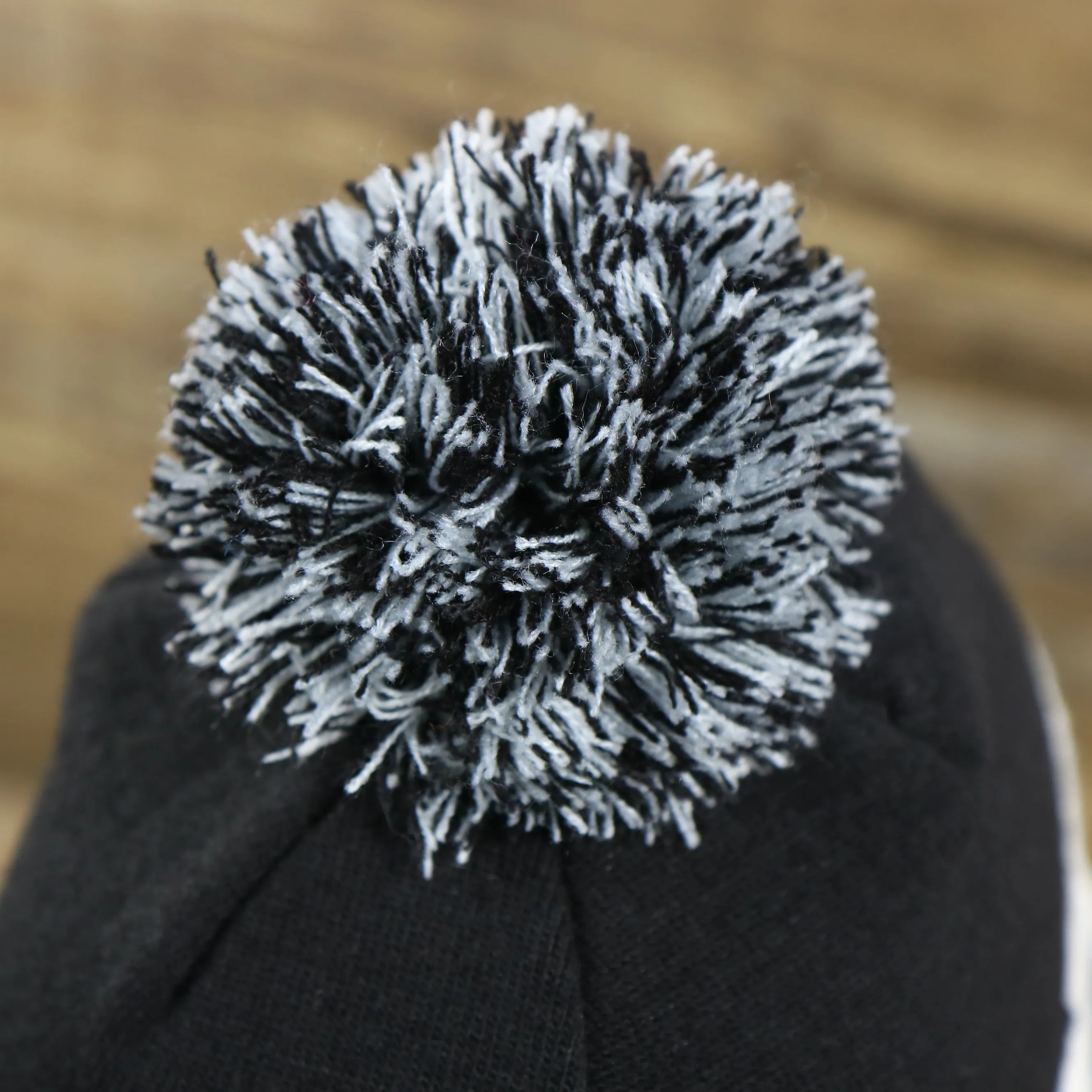 Black, White, and Gray Striped Winter Beanie with Pom Pom - Brooklyn Nets Collection