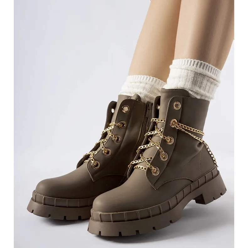 Brown hiking boots with Alcin chain