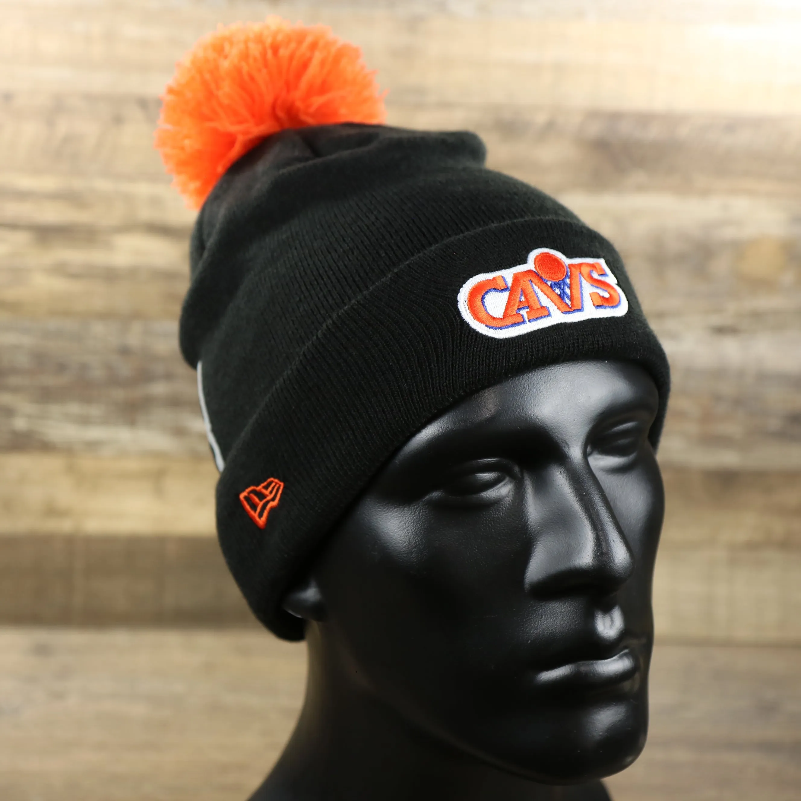 Cleveland Cavaliers Winter Beanie with Retro Logo Patch and Orange Pom Pom | Black