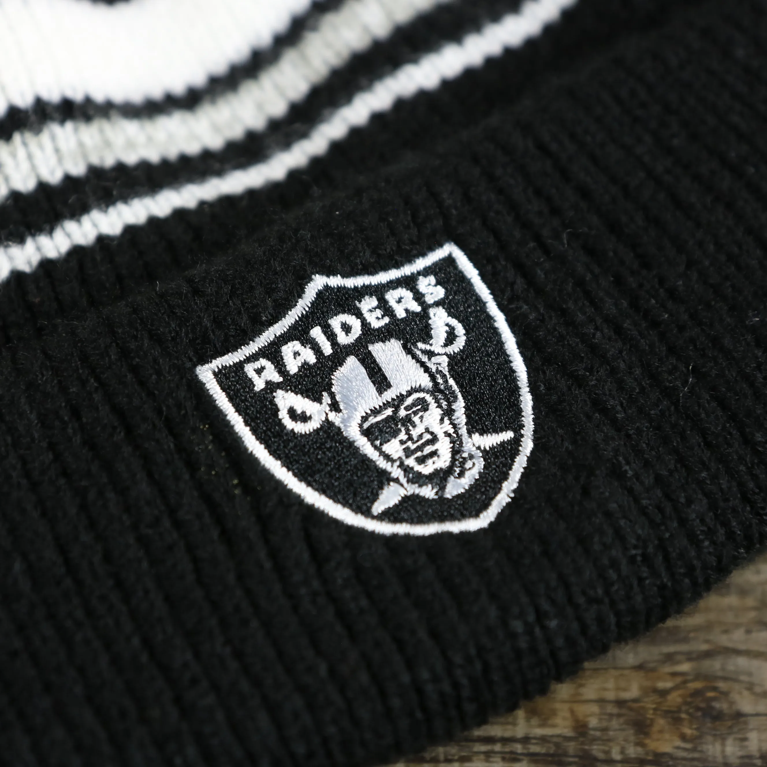 Kid's Oakland Raiders Winter Beanie - Striped Cuffed Black and Gray Hat with Pom Pom.