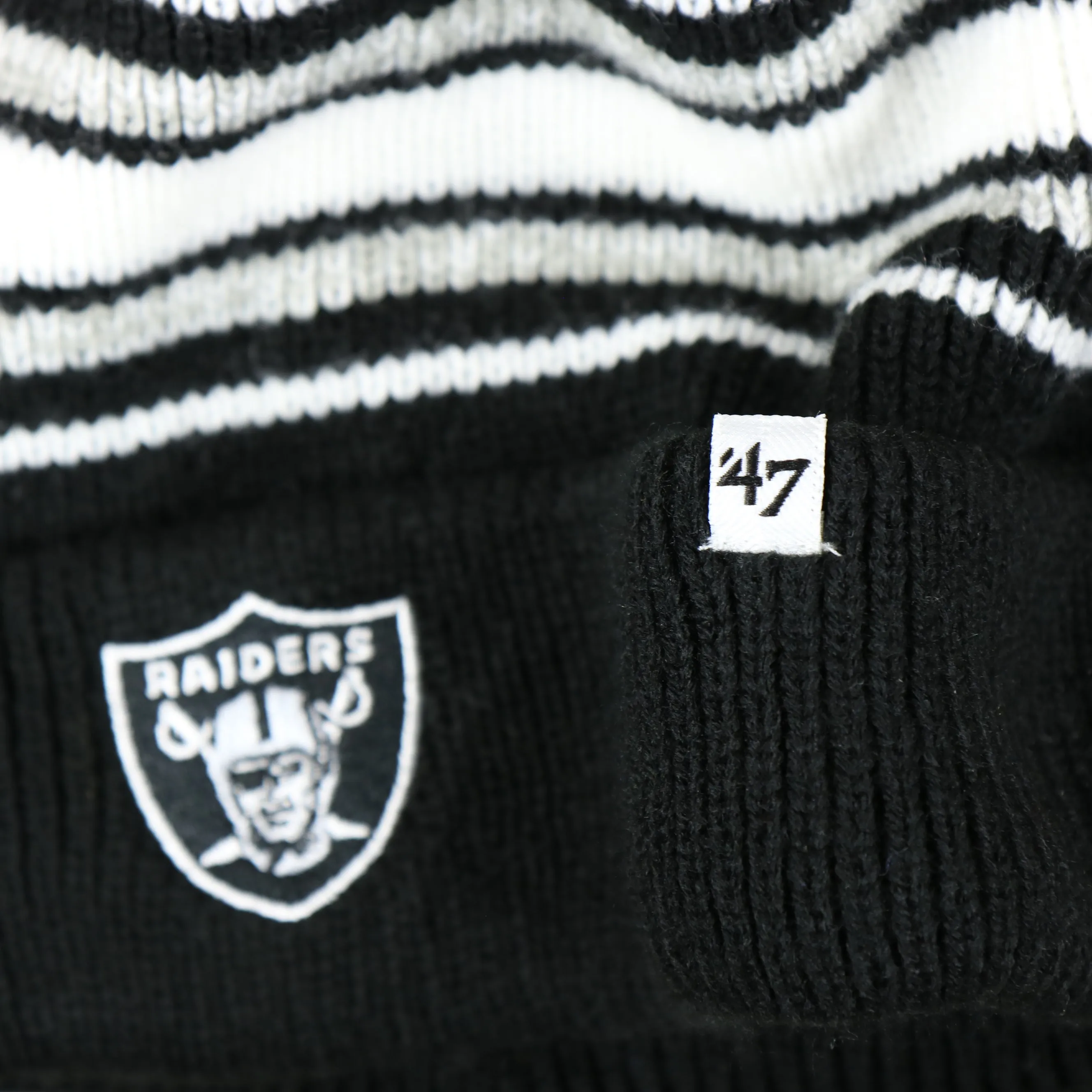 Kid's Oakland Raiders Winter Beanie - Striped Cuffed Black and Gray Hat with Pom Pom.