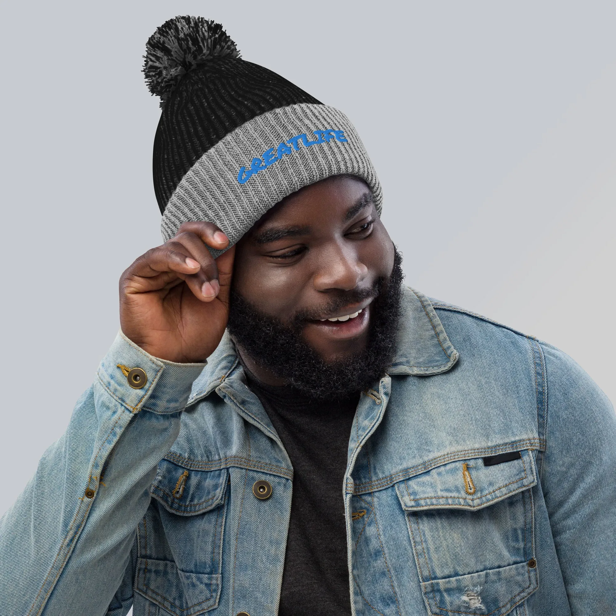 NEW BLACK AND BLUE GREATLIFE Pom-Pom Beanie (grey features)