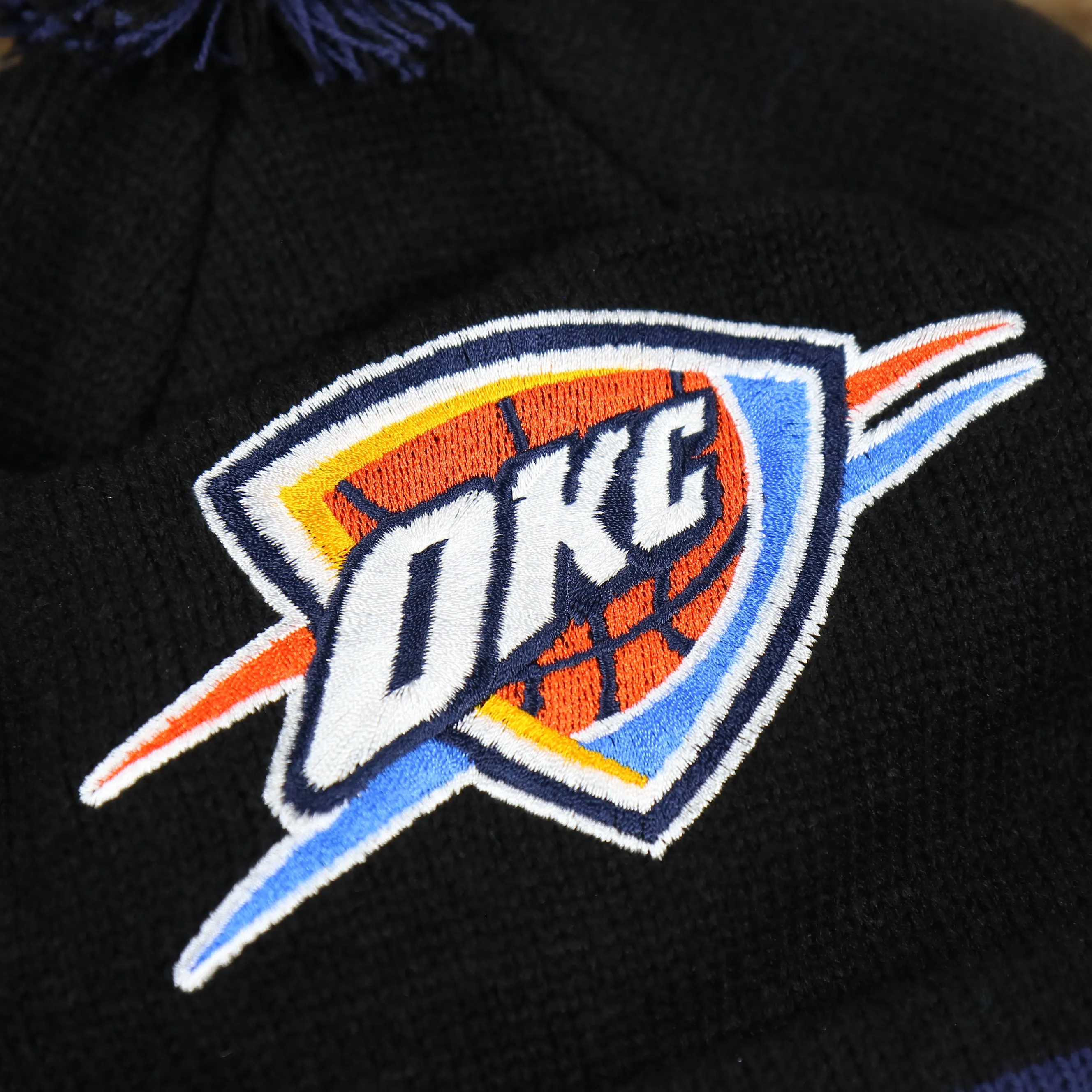 Oklahoma City Thunder Winter Beanie - Blackout Knit with Multi Colored Pom Pom | Black Beanie