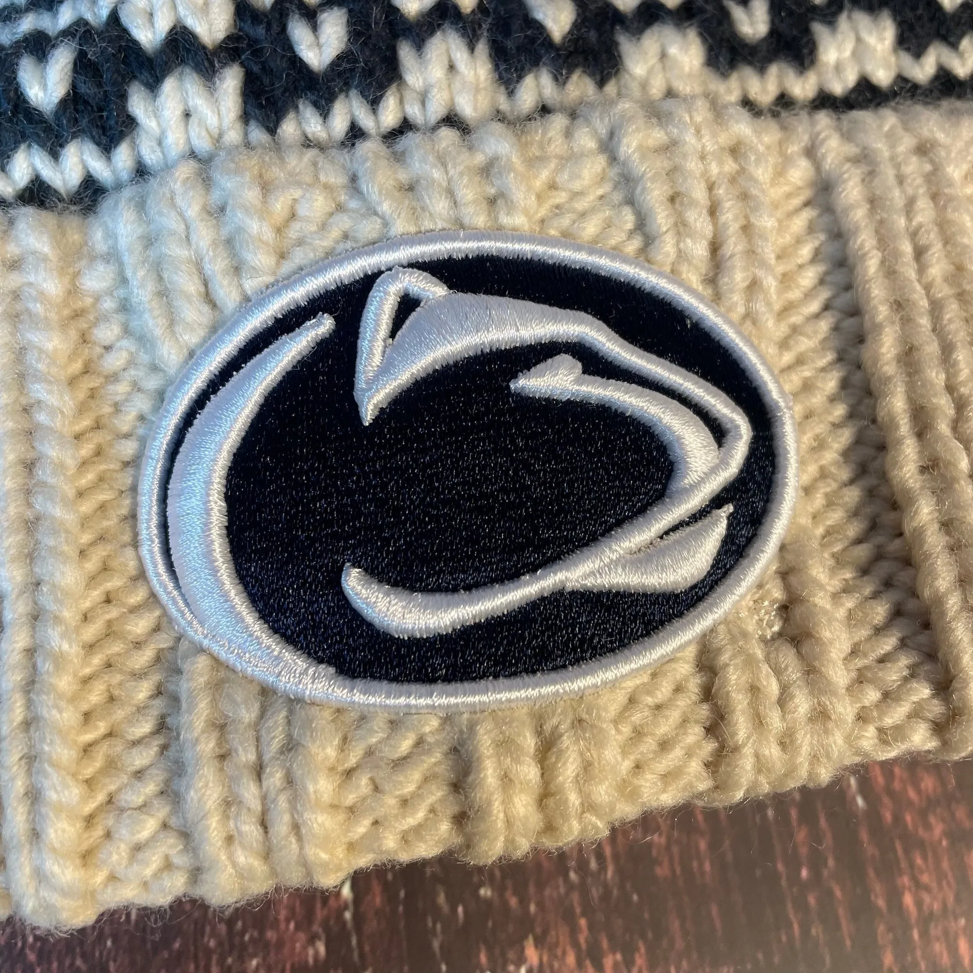 Penn State Nittany Lions Cable Knit Cuffed Large Team Wordmark Cream Women's Pom Pom Beanie | New Era - Cream.